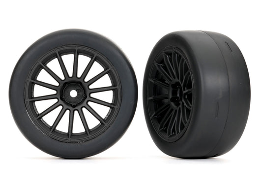 Traxxas Tires & Wheels, Assembled, Glued (multi-spoke black wheels, 2.0" ultra-wide slick tires, foam inserts) (front) (2) (9374) TRAXXAS