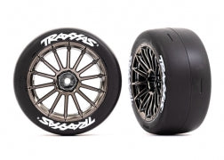 Traxxas: Tires & wheels, assembled, glued (multi-spoke black chrome wheels, 2.0" slick tires with Traxxas® logo, foam inserts) (front) (2) (VXL rated) (9347R)