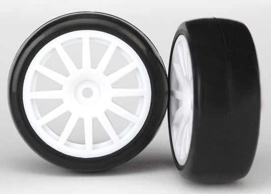 Traxxas Tires & wheels, assembled, glued (12-spoke white wheels, slick tires) (2) (7572)